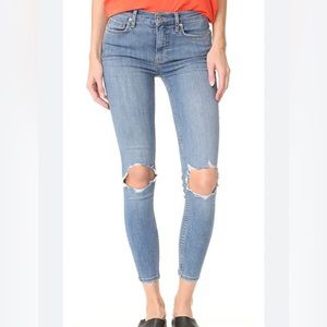 Free people. Light wash skinny jeans. Distressed knees. Size 25.